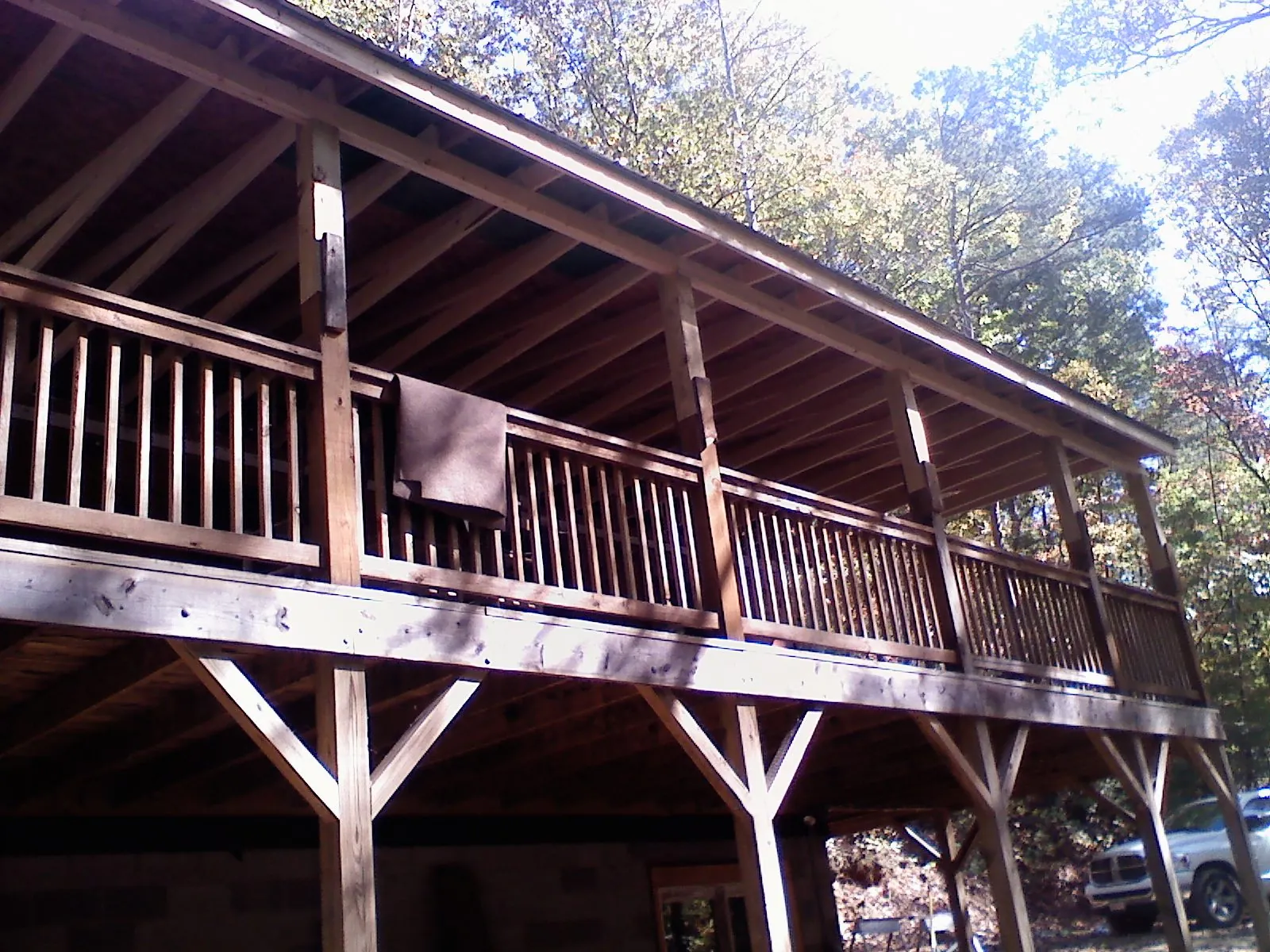 Timber framing under a new elevated porch and deck — Roof Leak Repair in Montrose by Roofing Brothers